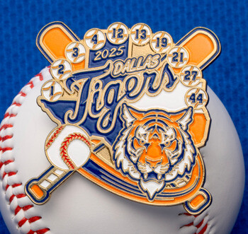 Custom 2025 Dallas Tigers baseball trading pin featuring a tiger head, crossed bats, and player numbers, displayed on a baseball.