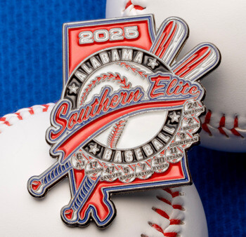 A custom 2025 Alabama Southern Elite Baseball trading pin with crossed bats and player names, resting on two baseballs against a blue fabric background.