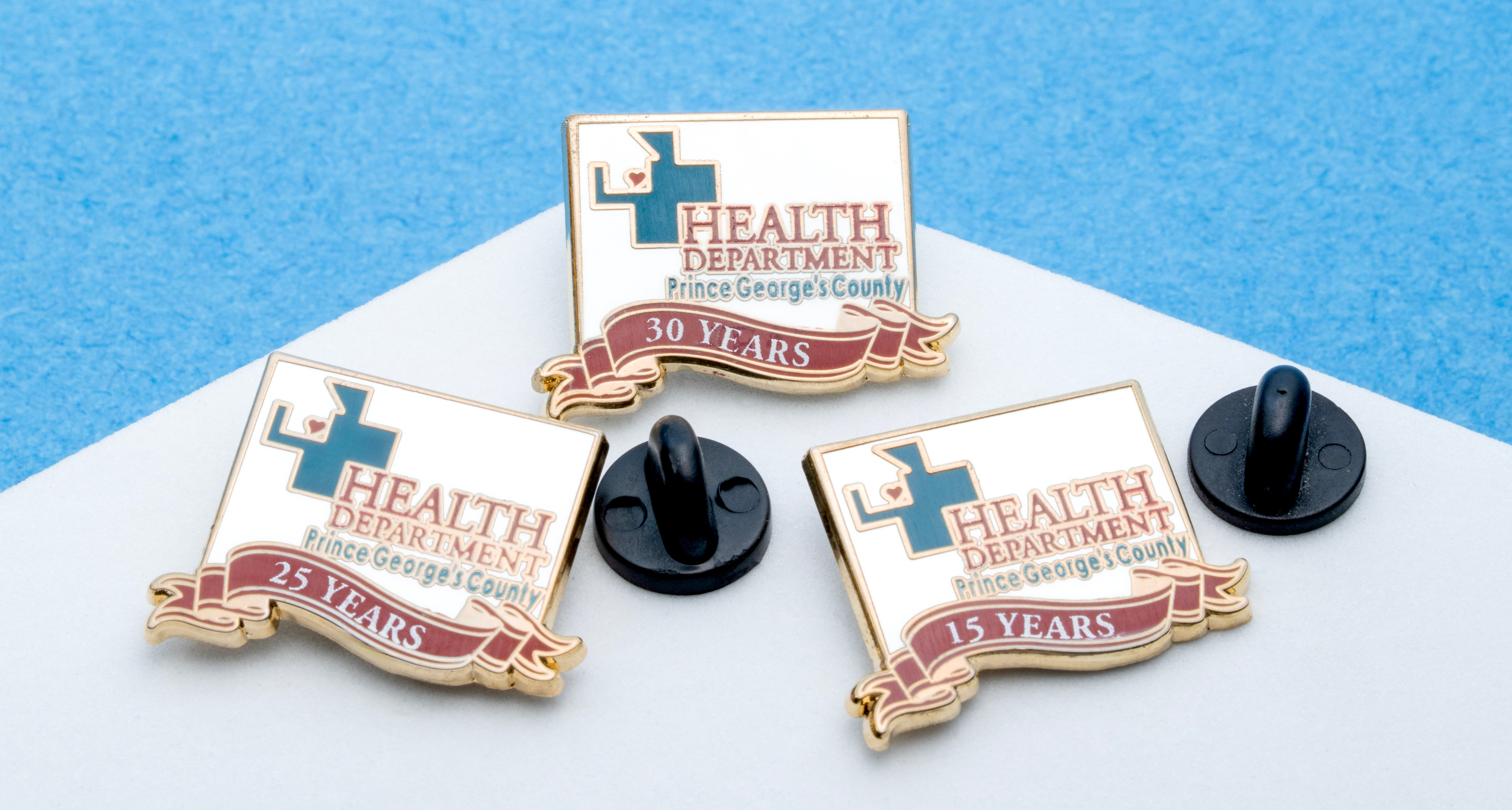 map[name:Three gold lapel pins for Prince George's County Health Department commemorating 15, 25, and 30 years of service. naturalSort:Three gold lapel pins for Prince George's County Health Department commemorating 00000000000000000000000000000015.00000000000000000000000000000000 , 00000000000000000000000000000025.00000000000000000000000000000000 , and 00000000000000000000000000000030.00000000000000000000000000000000  years of service.]