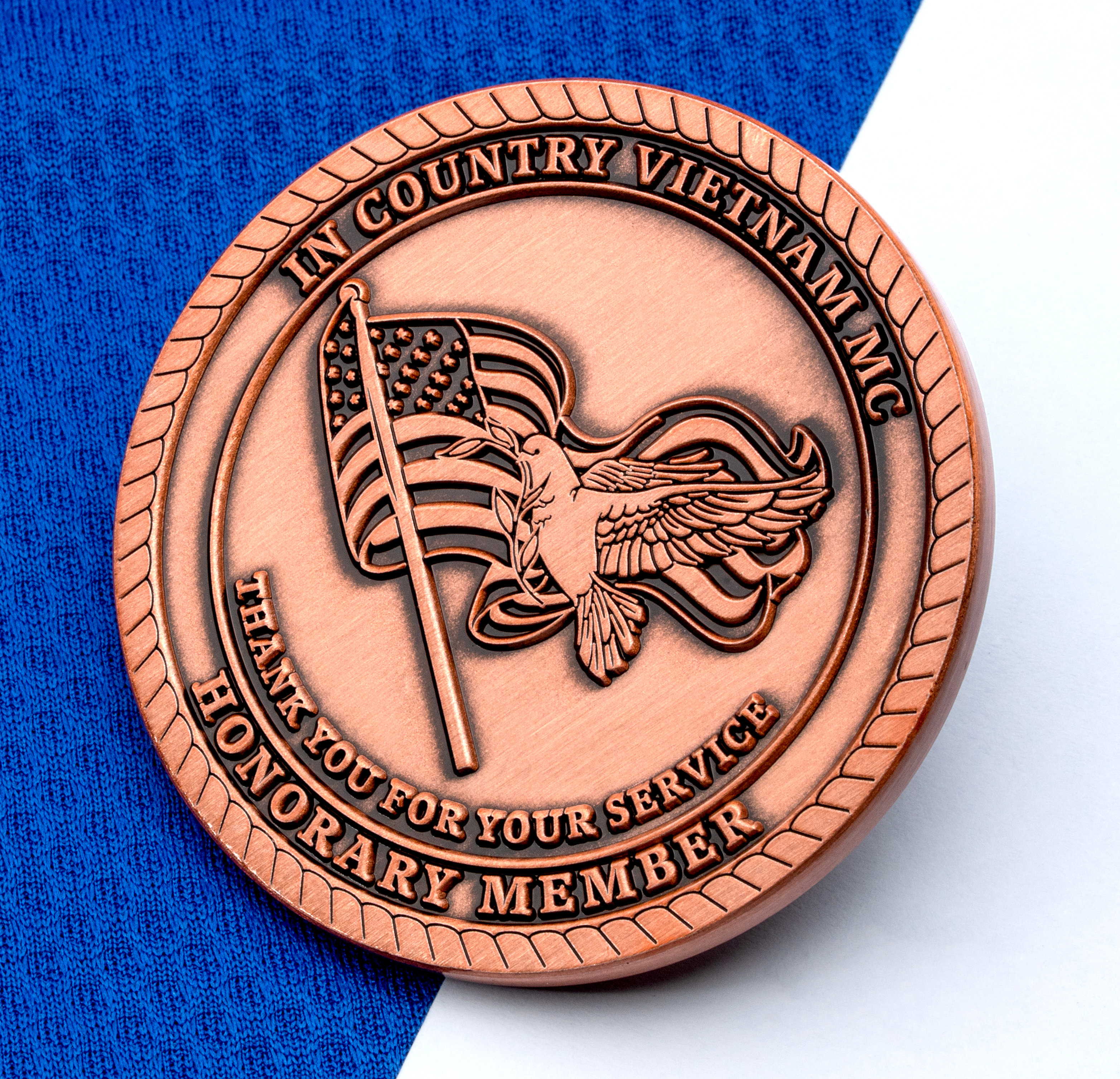 map[name:Antique copper challenge coin for In Country Vietnam MC Honorary Member featuring a dove and American flag design. naturalSort:Antique copper challenge coin for In Country Vietnam MC Honorary Member featuring a dove and American flag design.]
