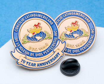 Gold and blue enamel lapel pins for Concilio Latinoamericano de la Iglesia de Dios Pentecostal 70 Year Anniversary with a globe and crown logo.