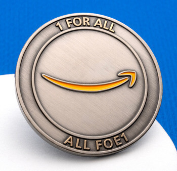 Satin nickel challenge coin featuring the Amazon smile logo and the text 1 For All All For 1.