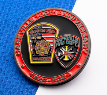 Hapeville 100th Anniversary challenge coin featuring Hapeville Fire Dept and Fire & Rescue emblems on a black and red design.