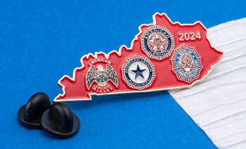 Red enamel lapel pin shaped like Kentucky featuring the 2024 date and logos for American Legion Riders, Auxiliary, and Sons of the American Legion.