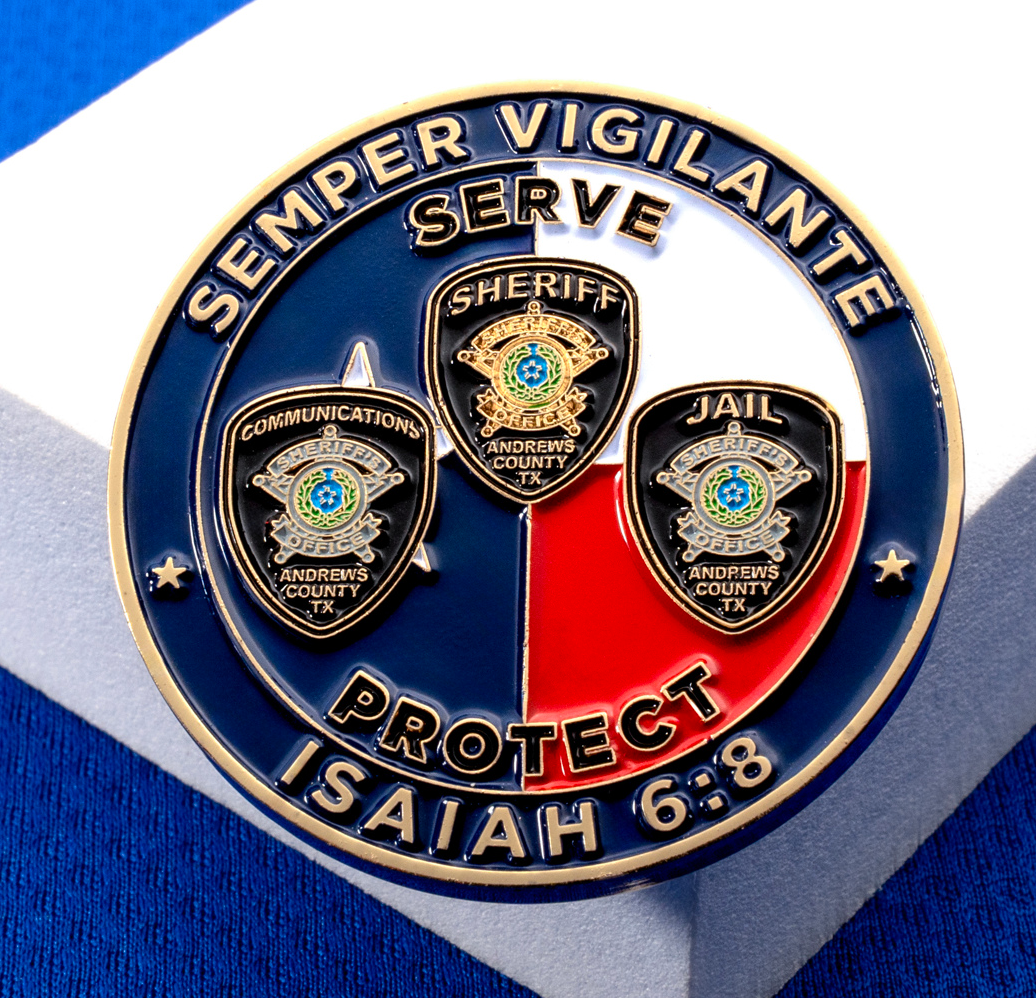 Circular challenge coin featuring Andrews County Sheriff, Jail, and Communications badges with a red, white, and blue background.