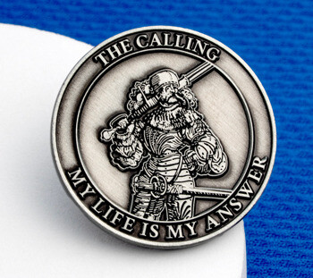 Antiqued silver challenge coin featuring a knight with a sword and the text The Calling, My Life Is My Answer.