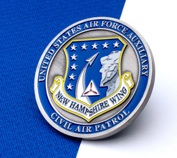 United States Air Force Auxiliary Civil Air Patrol New Hampshire Wing challenge coin with blue enamel and silver finish.