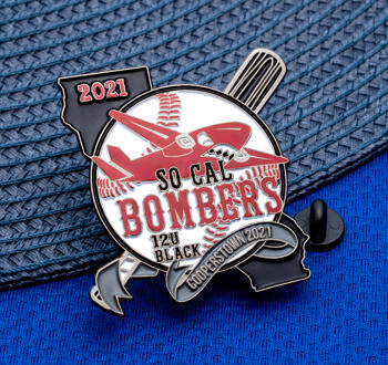 So Cal Bombers baseball trading lapel pin featuring a red bomber plane, baseball, and bat design with Cooperstown 2021 text.