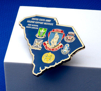 South Carolina state-shaped lapel pin for the United States Army Soldier Support Institute featuring multiple military emblems on a blue background.