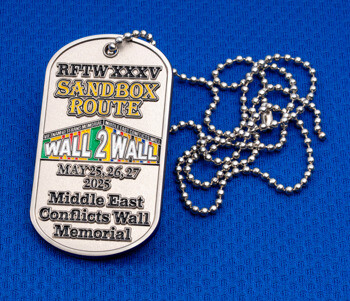 Sandbox Route Wall 2 Wall custom military dog tag with ball chain on a textured blue background.