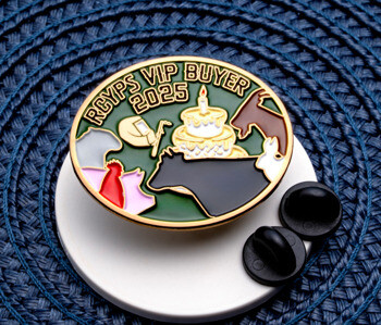 RCYPS VIP Buyer 2025 lapel pin featuring colorful animal silhouettes and a cake on a green background.