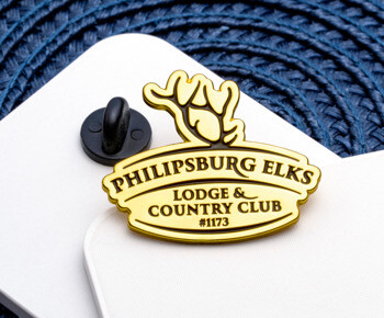 Gold-plated Philipsburg Elks Lodge and Country Club lapel pin with black rubber clutch backing.