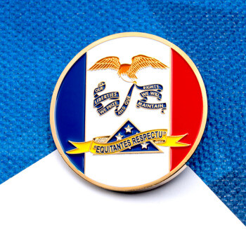 Circular challenge coin featuring the Iowa State Flag design with an eagle, folded flag, and yellow banner reading Equitantes Respectu.
